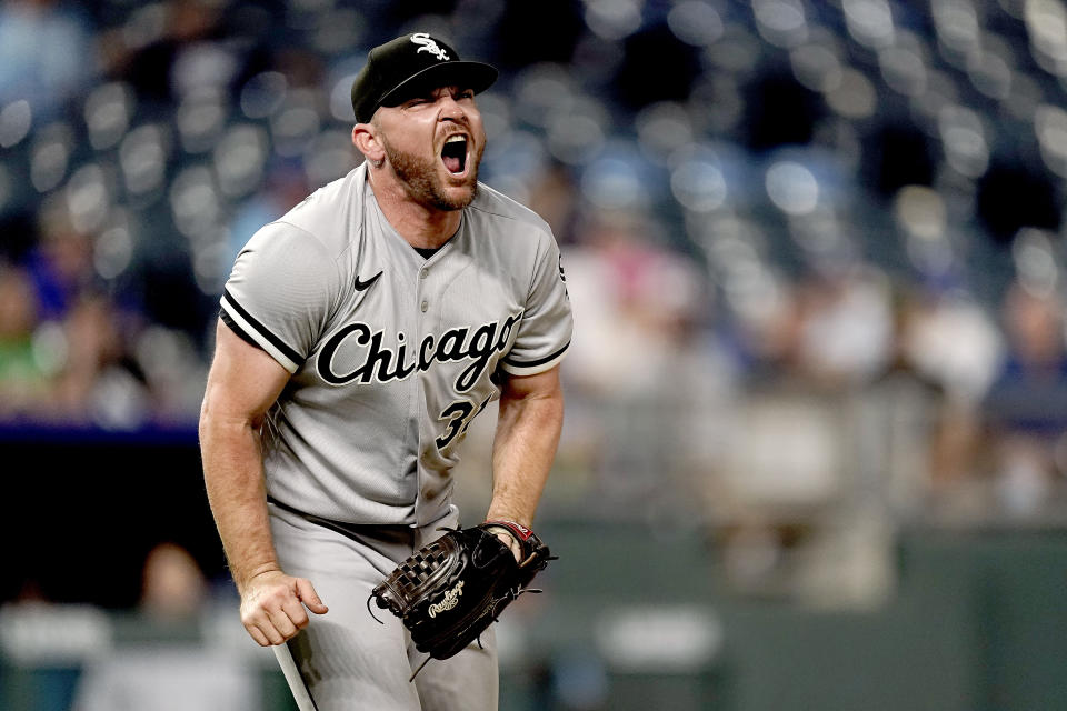 Chicago White Sox relief pitcher Liam Hendriks celebrates after the second game of a baseball doubleheader against the Kansas City Royals Tuesday, Aug. 9, 2022, in Kansas City, Mo. The White Sox won 3-2. (AP Photo/Charlie Riedel)