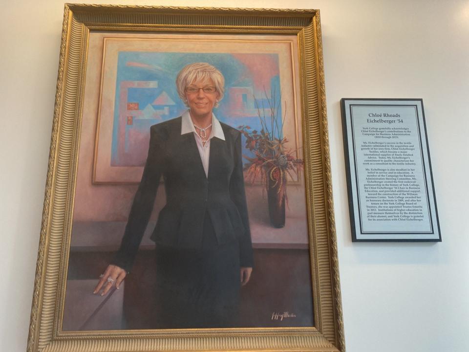 This portrait of Chloé Eichelberger can be seen in the Willman Business Center on the York College campus. Yorkview Hall tops off the business center.