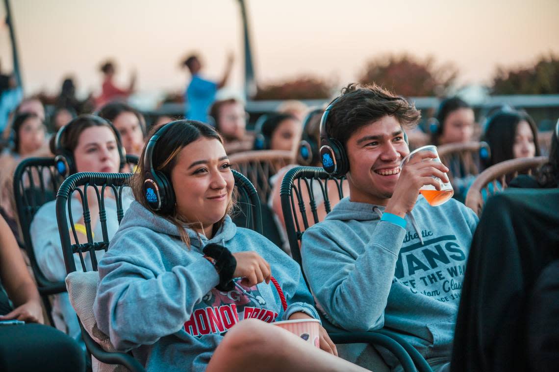 Patrons watch a movie at a Rooftop Cinema Club location in Los Angeles.