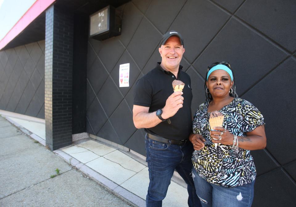 David Beck, owner, and Tammie Manuel, manager, are shown outside the future home 2 Scoopz ice cream shop in Canton in a photo from June 27, 2022.