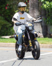 <p>Justin Bieber goes for a joy ride on his custom Drew motorcycle on Tuesday in Los Angeles.</p>