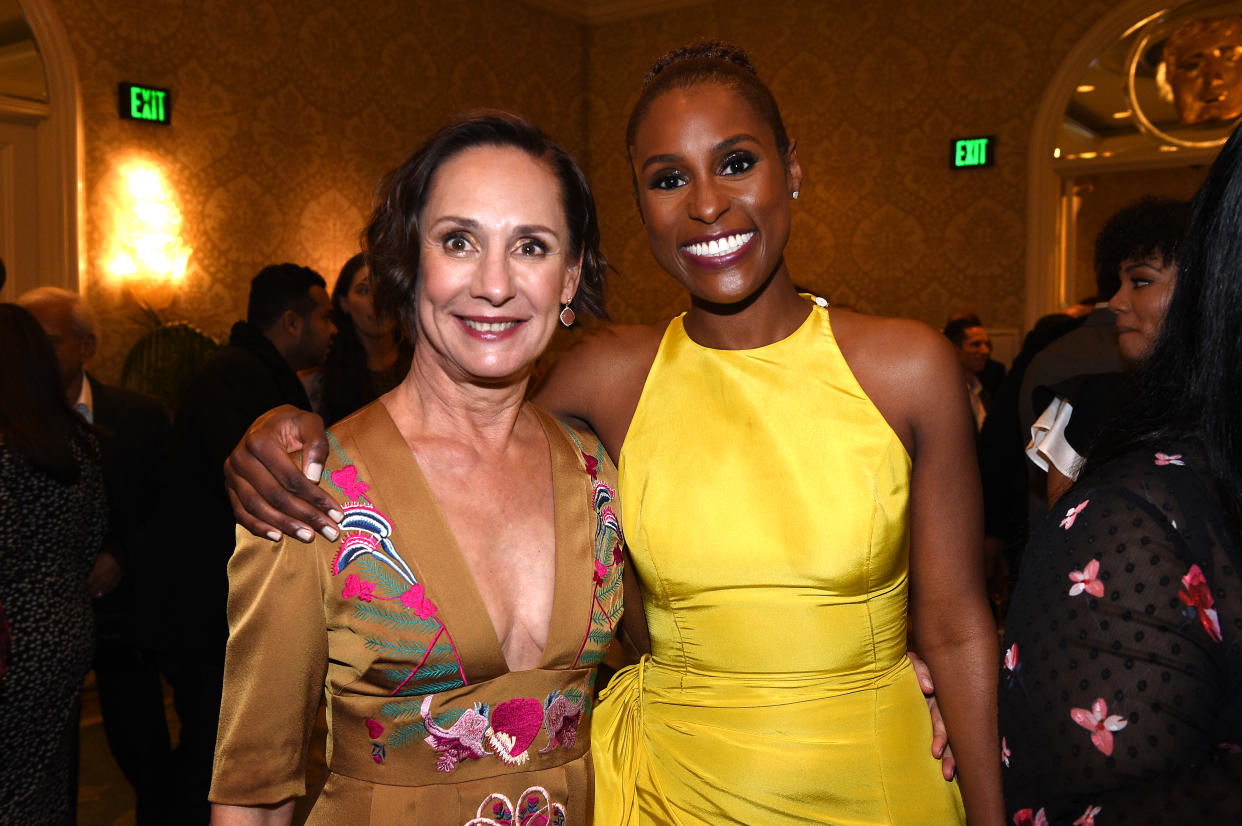 Laurie Metcalf, left, and Issa Rae were among the stars of film and TV gathered at the BAFTA Los Angeles Tea Party at the Four Seasons in Beverly Hills on Jan. 6, 2018. (Photo: Getty Images)