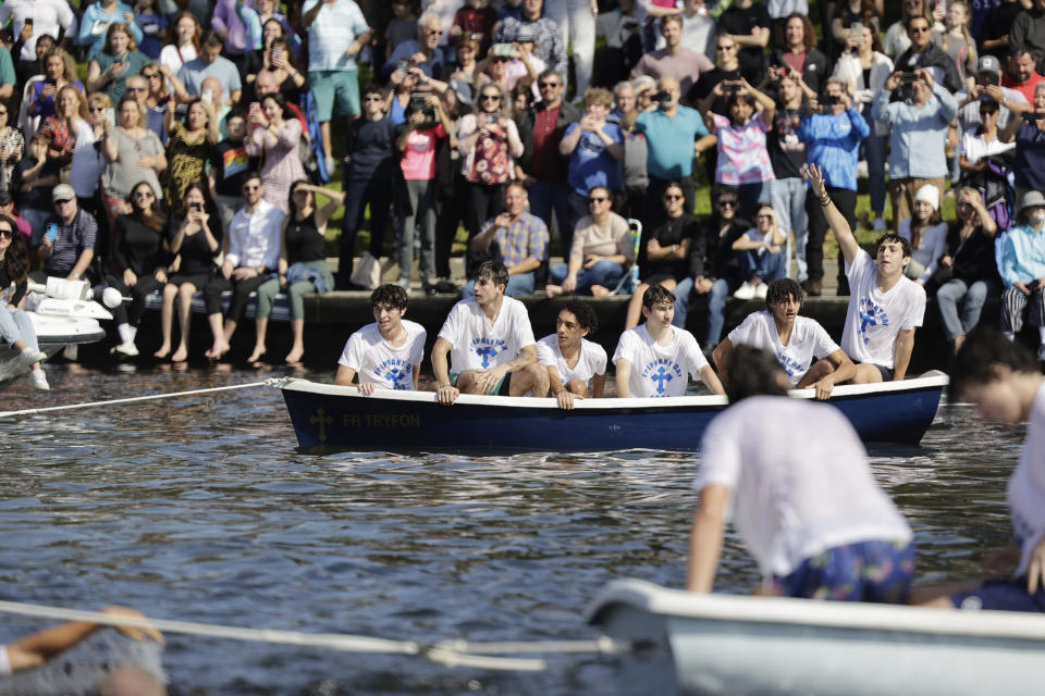 Divers wait to retrieve the cross during the 2024 Epiphany at Spring Bayou on Saturday, Jan. 6, 2024 in Tarpon Springs, Fla. (Luis Santana/Tampa Bay Times via AP)