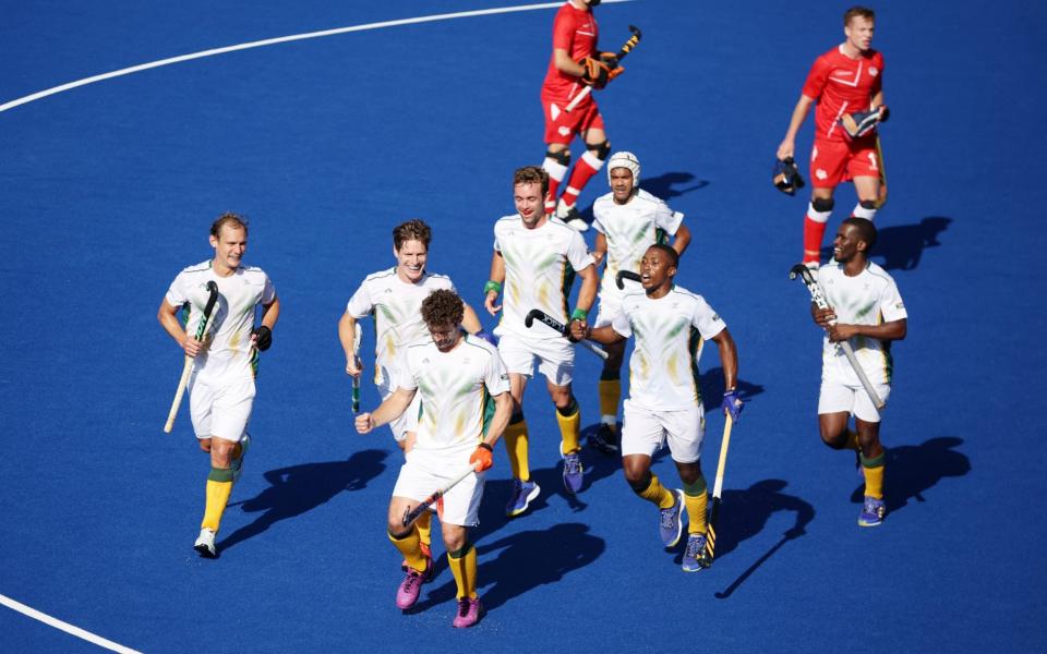 South Africa's Matt Guise-Brown celebrates scoring his first goal with teammates - Reuters