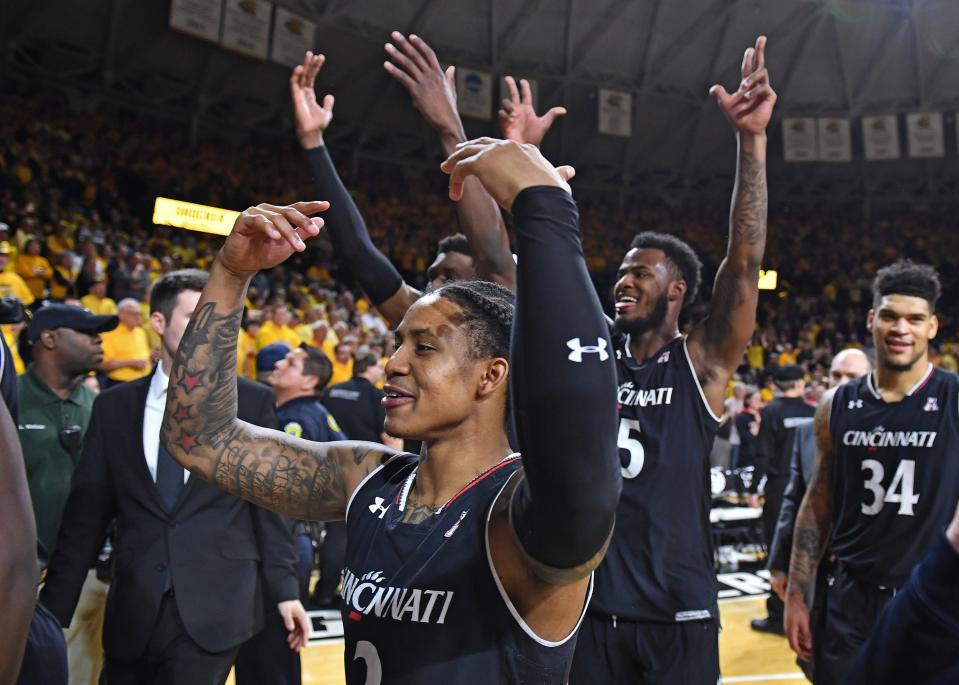 Cincinnati Bearcats players celebrate after beating the Wichita State Shockers for the AAC title. (Getty Images)