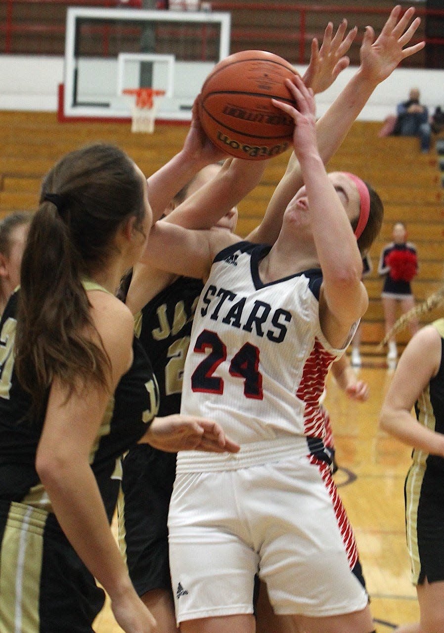 BNL senior Carlee Kern draws a foul against Jasper Saturday during a 60-31 win at BNL Fieldhouse.