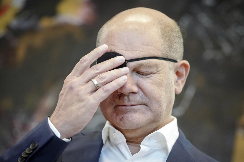 German Chancellor and member of the German Social Democratic Party (SPD), Olaf Scholz, attends his party's federal parliamentary group meeting at the Reichstag building, home of the German federal parliament, Bundestag, in Germany, Monday, Sept. 4, 2023. German Chancellor Olaf Scholz has tweeted a pirate-style picture of himself with a black eye patch and dark-red bruises on the right side of his face — the result of a jogging accident on the weekend. The chancellor wrote Monday in the caption of the photo that he was “excited to see the memes.” (Kay Nietfeld/dpa via AP)