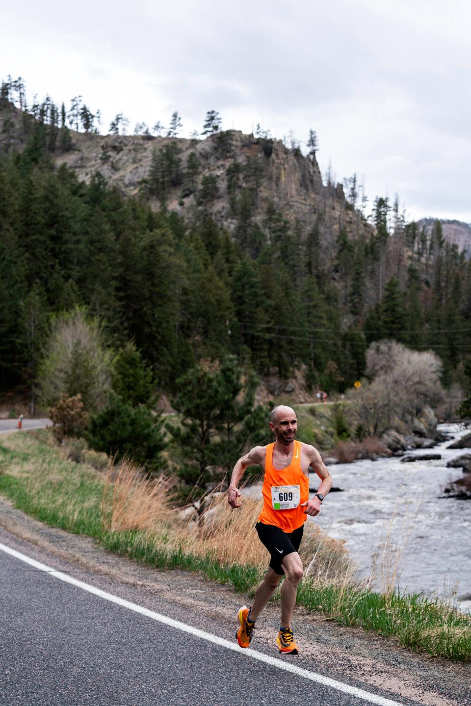 Matthew Drake comes down Poudre Canyon during the Colorado Marathon on Sunday, May 7, 2023. Drake finished with a time of 2:36:59 to place 5th overall.
