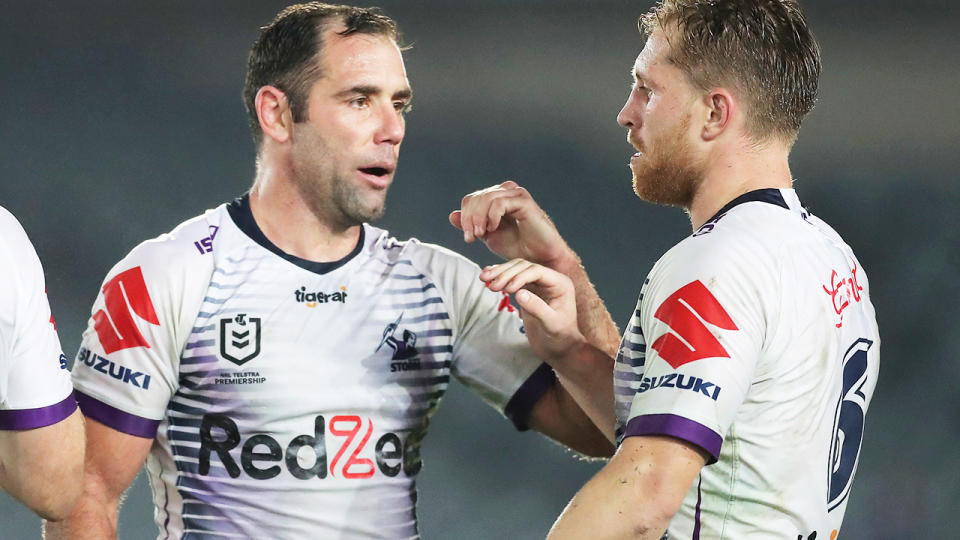 Cameron Smith and Cameron Munster, pictured here celebrating Melbourne's win over Newcastle.