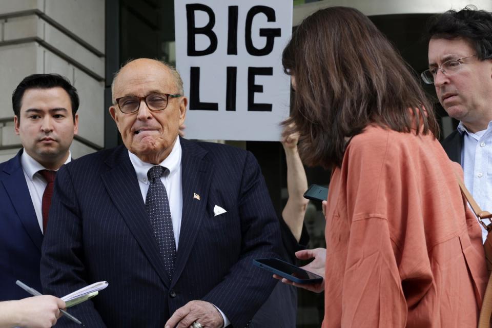 Mr Giuliani filed for bankruptcy in December after being ordered to pay $148m to the two women (Getty Images)