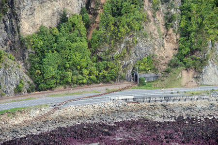 A railway track lies damaged across State Highway One near Kaikoura on the upper east coast of South Island. Sgt Sam Shepherd/Courtesy of Royal New Zealand Defence Force/Handout via REUTERS