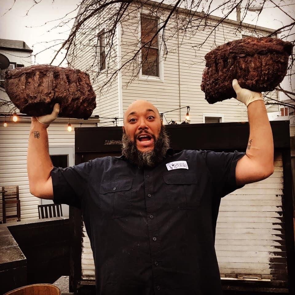 Pitmaster Chris Williams is the owner of Four Pegs Smokehouse and will be competing on 'BBQ Brawl with Bobby Flay' beginning July 10, 2023