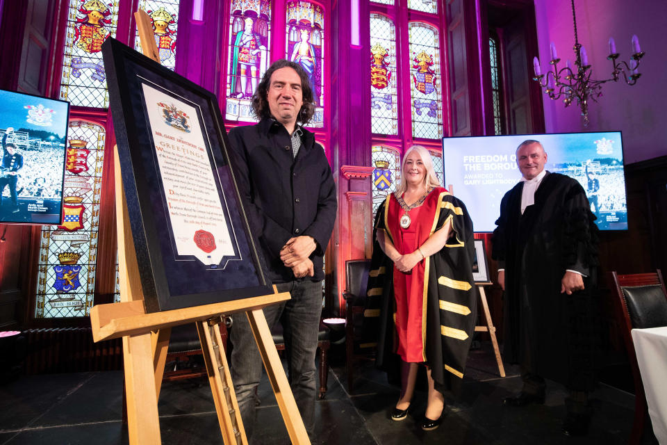 Gary Lightbody with mayor Karen Douglas and council chief executive Stephen Reid (Kelvin Boyes/PA)