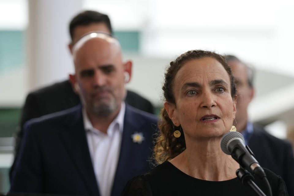 Rabbi Gayle Pomerantz speaks during an empty Shabbat table event honoring those kidnapped by Hamas in Israel, Thursday, Nov. 2, 2023, at Temple Beth Sholom in Miami Beach, Fla. “As Jews, we’re oriented toward hope. No matter how dark things seem, we can find light,” says the senior rabbi at Temple Beth Sholom. (AP Photo/Wilfredo Lee)