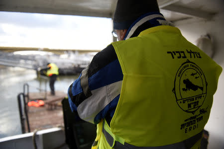 Volunteers of Israeli rescue and recovery organisation ZAKA scan the Danube river with an underwater sonar to map out the whereabouts of the remains of Holocaust victims murdered on the banks of the river in 1944 in Budapest, Hungary January 15, 2019. REUTERS/Tamas Kaszas