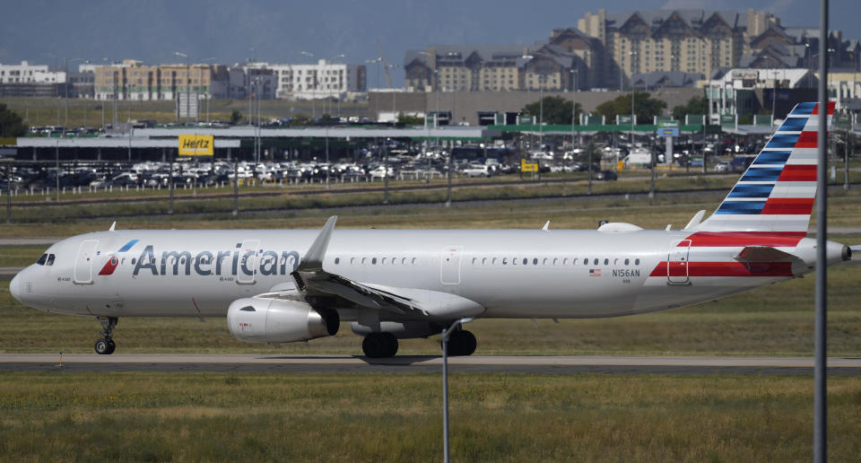 FILE - An American Airlines jetliner waits on a runway for departure from Denver International Airport Friday, Sept. 1, 2023, in Denver. American Airlines reports earnings on Thursday, April 25, 2024. (AP Photo/David Zalubowski, File)