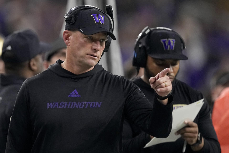 Washington head coach Kalen DeBoer watches during the first half of the national championship NCAA College Football Playoff game against Michigan Monday, Jan. 8, 2024, in Houston. (AP Photo/Eric Gay)