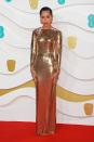 <p>Zoë Kravitz wore head-to-toe gold sequins in Saint Laurent on the red carpet with Maria Tash jewellery.</p>