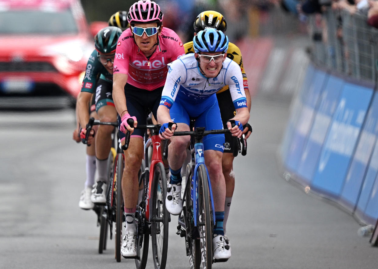  CRANS-MONTANA, SWITZERLAND - MAY 19: (L-R)  Geraint Thomas of The United Kingdom and Team INEOS Grenadiers - Pink Leader Jersey and Eddie Dunbar of Ireland and Team Jayco AlUla cross the finish line during the 106th Giro d'Italia 2023, Stage 13 a 75km stage from Le Chable to Crans-Montana - Valais 1456m - Stage shortened due to the adverse weather conditions / #UCIWT / on May 19, 2023 in Crans-Montana, Switzerland. (Photo by Stuart Franklin/Getty Images,) 