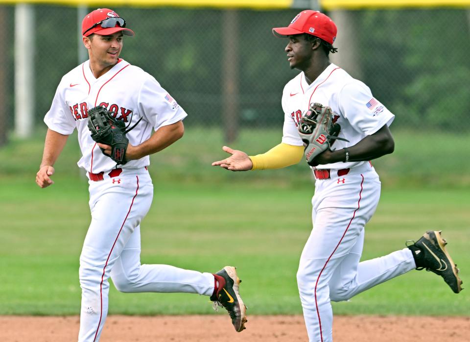 In this July photo, Yarmouth-Dennis shortstop (left) Ryan Jackson of USC and second baseman RJ Austin of Vanderbilt come off the field after a double play against Orleans in Cape League action.