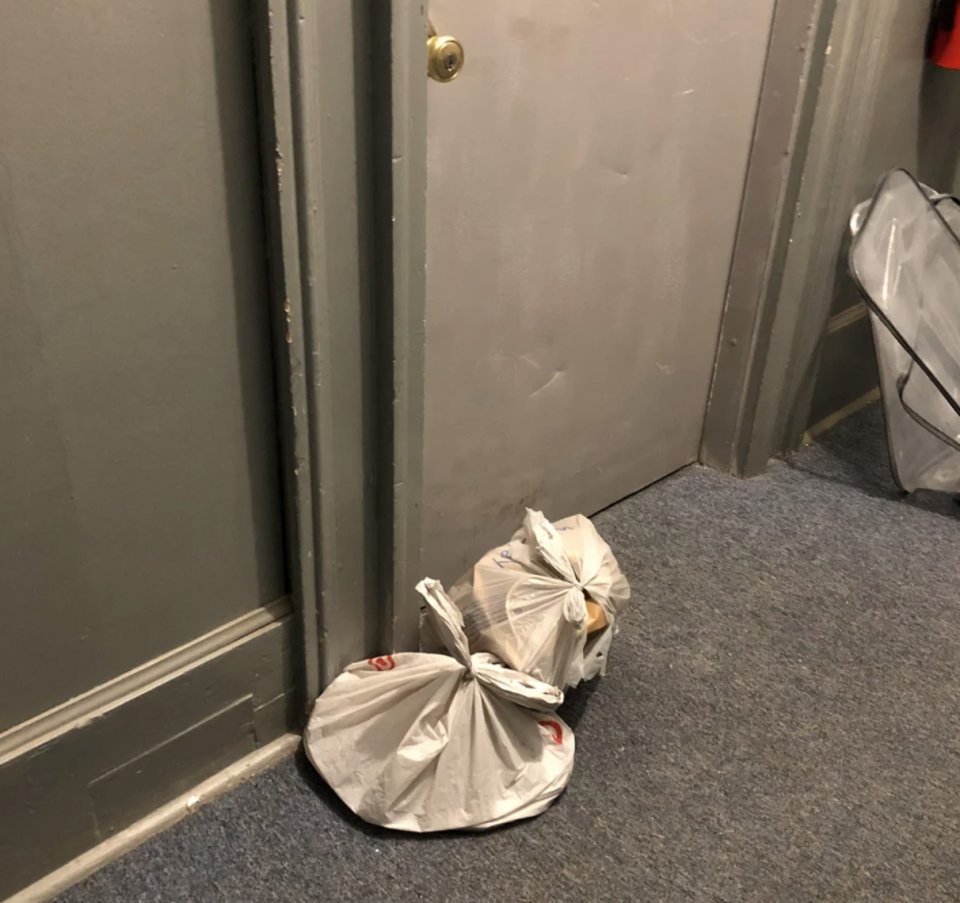 Cat litter outside of someone's door