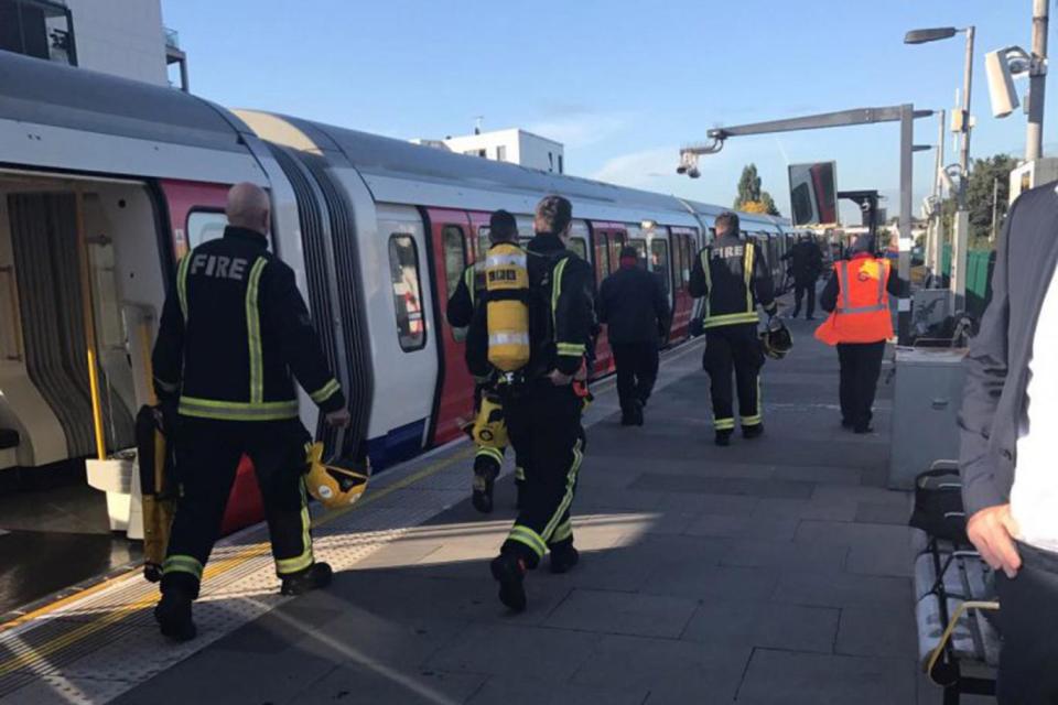 Firefighters storm the platform following the incident. (Metro)