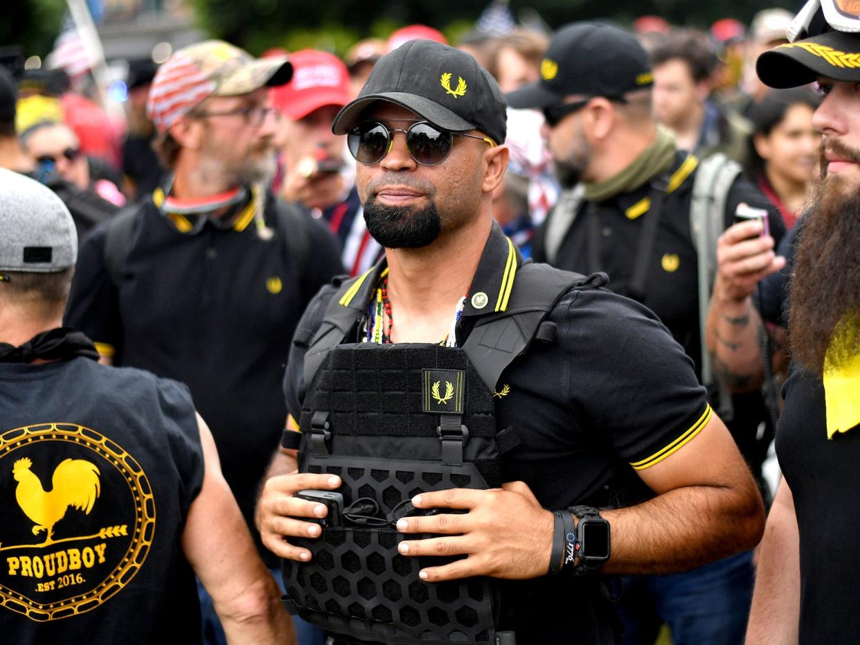 In this Aug. 17, 2019, file photo, Proud Boys chairman Enrique Tarrio rallies in Portland, Ore.