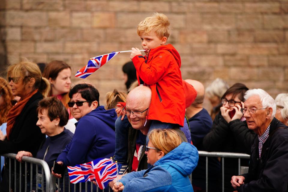 Crowds wait to see the Duke and Duchess of Cambridge, Prince George and Princess Charlotte (PA)