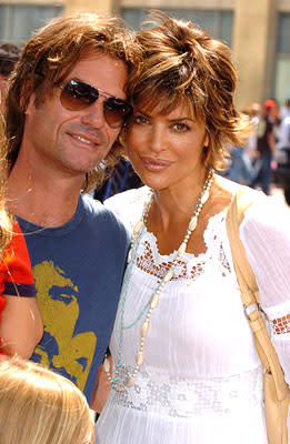 Harry Hamlin and Lisa Rinna at the LA premiere of Warner Bros. Pictures' Charlie and the Chocolate Factory