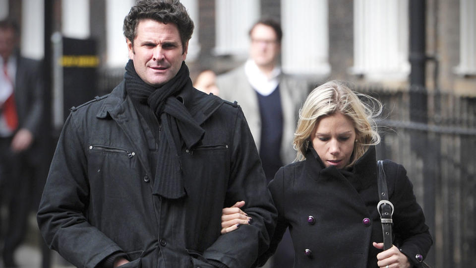 Chris and wife Melanie Cairns are seen here walking arm in arm. 