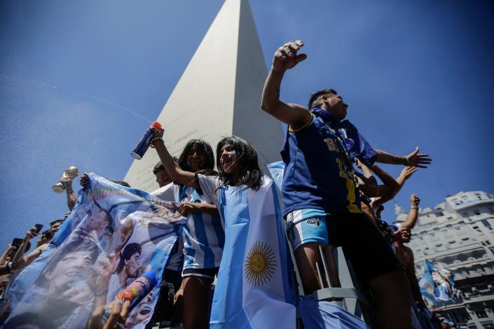 Fans of Argentina gather at the Obelisk to celebrate winning the Qatar 2022 World Cup against France in Buenos Aires, on December 18, 2022. (Photo by Emiliano Lasalvia / AFP) (Photo by EMILIANO LASALVIA/AFP via Getty Images)