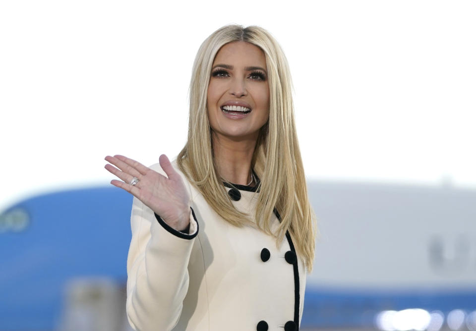 Ivanka Trump waves as she arrives at Joint Base Andrews in Maryland for US President Donald Trump's departure