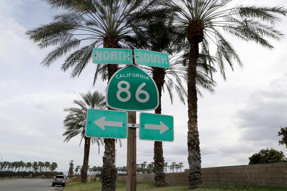 Five people including two children died in a car crash at the intersection of 81st Avenue and State Route 86 in Oasis, Calif., on Saturday, Jan. 14, 2023. A yellow ribbon, stretcher and other debris can be seen at the crash site on Sunday, Jan. 15, 2023. 