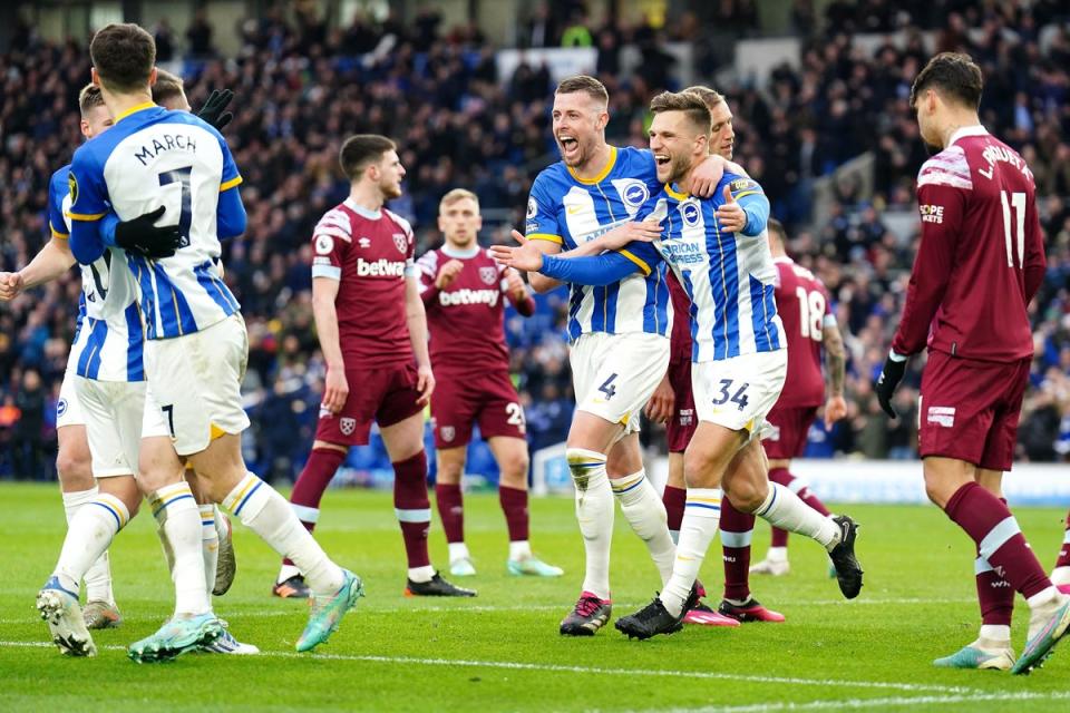 Brighton’s Joel Veltman (centre) celebrates scoring their side’s second goal against West Ham (Zac Goodwin/PA) (PA Wire)