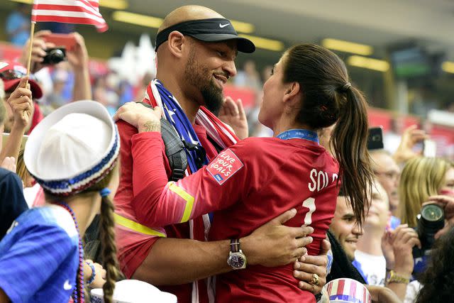 <p>FRANCK FIFE/AFP via Getty</p> Jerramy Stevens and Hope Solo during the 2015 FIFA Women's World Cup