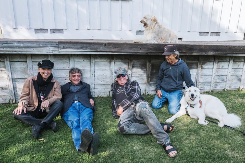 Nils Lofgren (left to right), Billy Talbot, Neil Young and Ralph Molina, pictured in 2022.