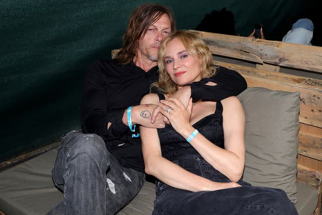 <p>Kevin Mazur/Getty Images</p> Norman Reedus and Diane Kruger.