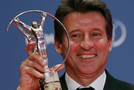 Sebastian Coe poses with his Laureus Lifetime Achievement Award during the 2013 Laureus World Sports Awards, at Municipal Theater in Rio de Janeiro March 11, 2013. REUTERS/Sergio Moraes