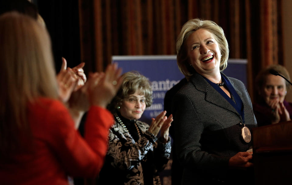 WASHINGTON, DC - DECEMBER 06:  While delivering remarks, former U.S. Secretary of State Hillary Clinton receives a standing ovation after being presented the 2013 Tom Lantos Human Rights Prize December 6, 2013 in Washington, DC. Clinton received the award for her work in the areas of women's rights and internet freedom.  (Photo by Win McNamee/Getty Images)