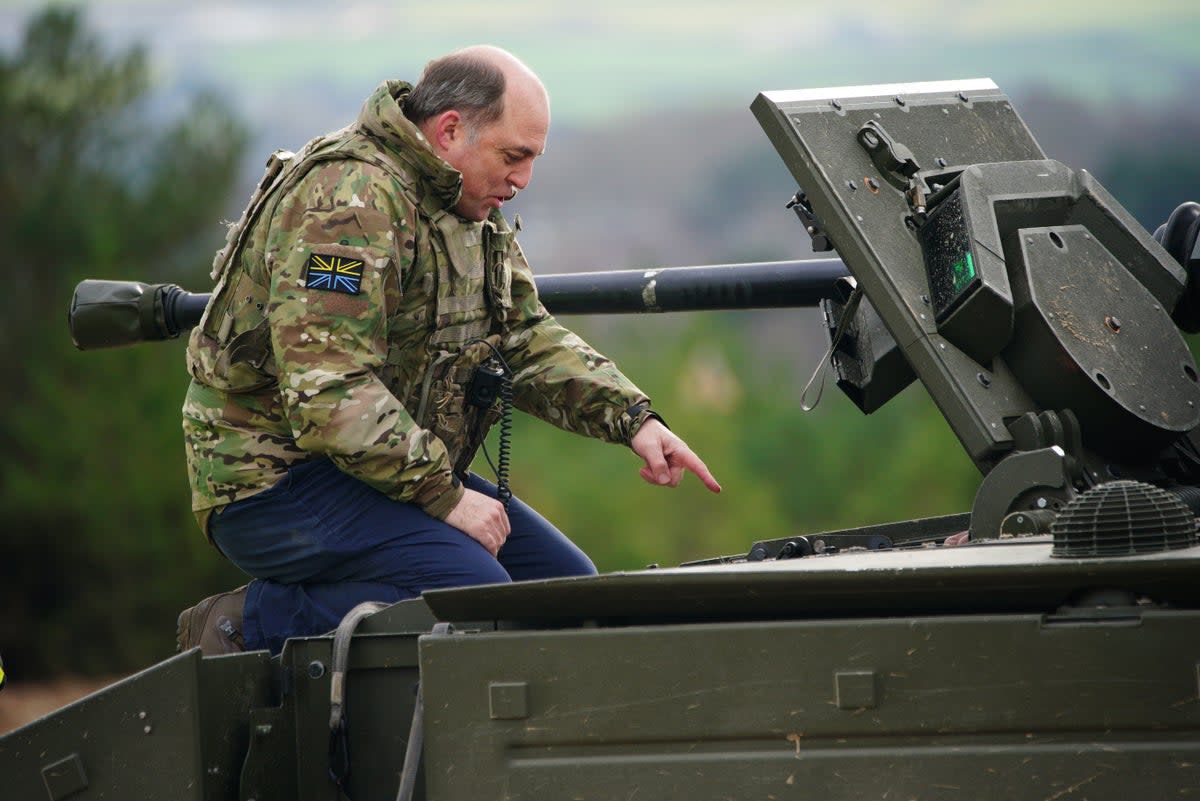 Ben Wallace during a visit to Bovington Camp in Dorset, to view Ukrainian soldiers training on Challenger 2 tanks (PA)