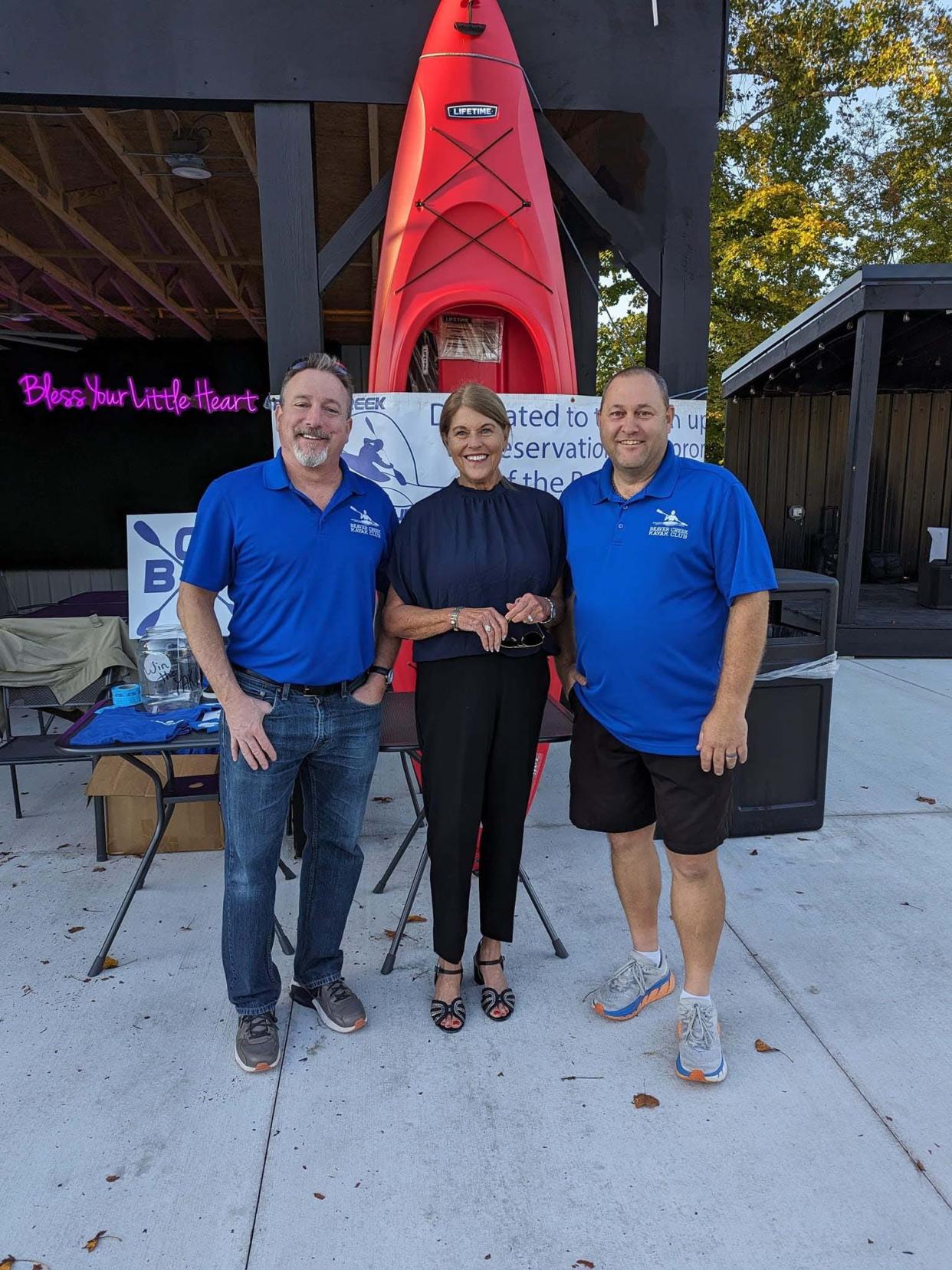 Josh Goldman, Commission Chair Tarry Hill, and Beaver Creek Kayak Club President Charlie Austin are all smiles at the third annual BCKC No-Yak event held at Creekside Good Food-Good Vibes on Saturday, Oct. 7, 2023.