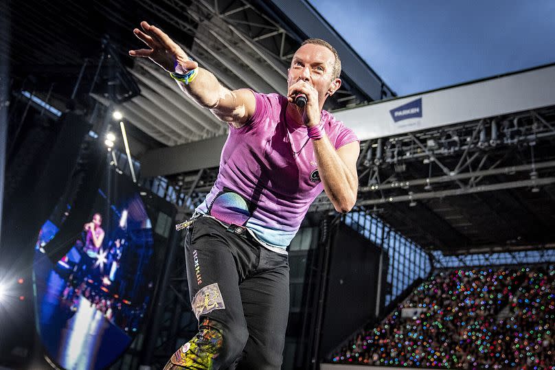 Singer Chris Martin of British band Coldplay performs at Parken Stadium in Copenhagen, Denmark, July 2023.