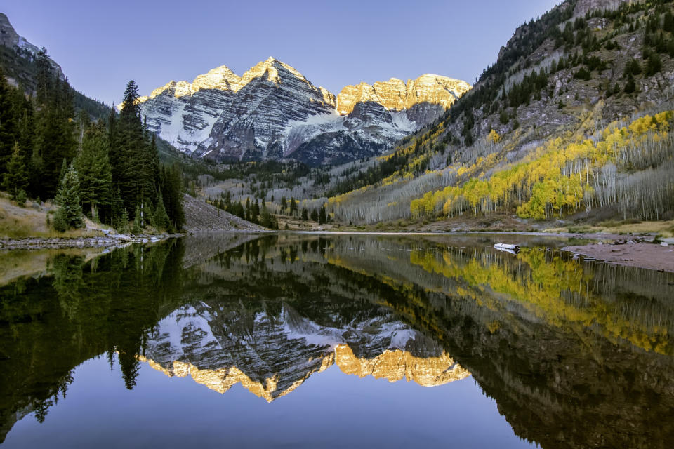 the Maroon Bell mountains at sunrise