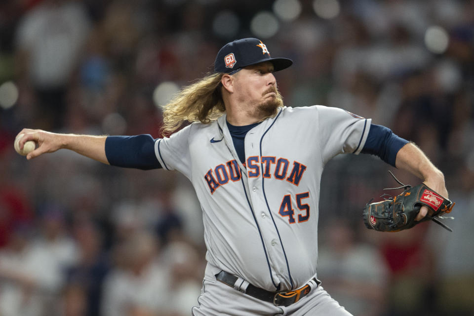 Houston Astros relief pitcher Ryne Stanek throws in the eleventh inning of a baseball game against the Atlanta Braves Saturday, Aug. 20, 2022, in Atlanta. (AP Photo/Hakim Wright Sr.)