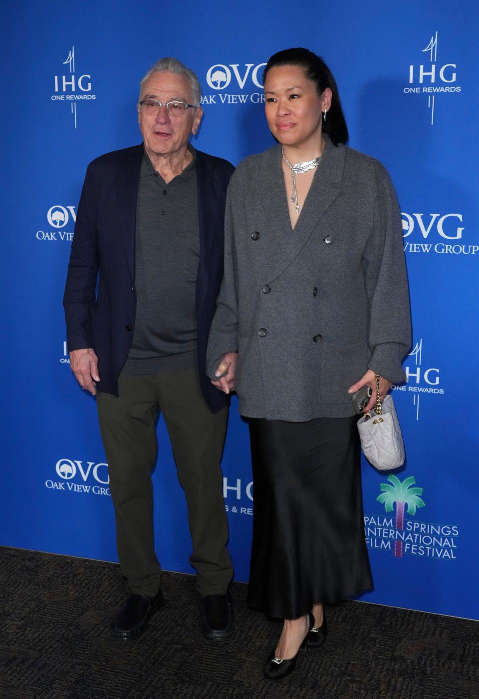 Robert De Niro and Tiffany Chen, pictured here at the Palm Springs International Film Festival Awards Gala on Jan. 4, 2024, welcomed their daughter, Gia, in April 2023.