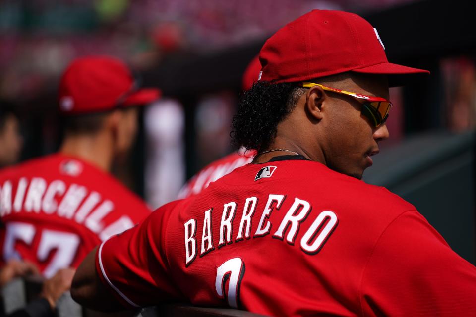 Cincinnati Reds shortstop Jose Barrero (2) sits in the dugout in the first inning of a baseball game against the Pittsburgh Pirates, Wednesday, Sept. 14, 2022, at Great American Ball Park in Cincinnati. 