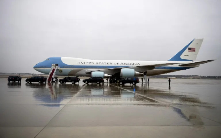 The US president is accompanied by a group of 13 White House journalists when he travels on Air Force One (POOL)