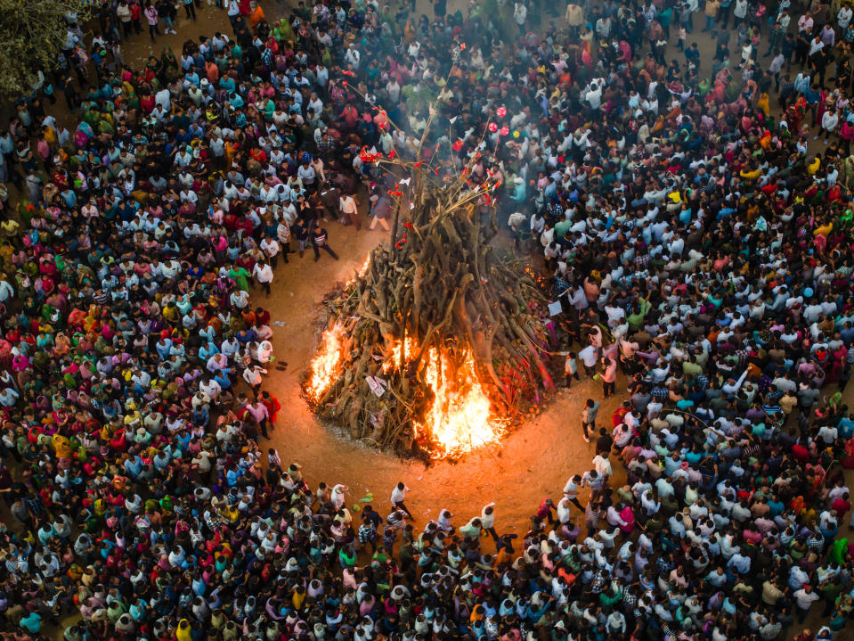 Devotees are performing the largest ''Holika Dahan'' as part of the Holi festival celebrations in a nearby village near Gandhinagar, the capital of Gujarat, on March 24, 2024. / Credit: Saurabh Sirohiya/NurPhoto via Getty Images