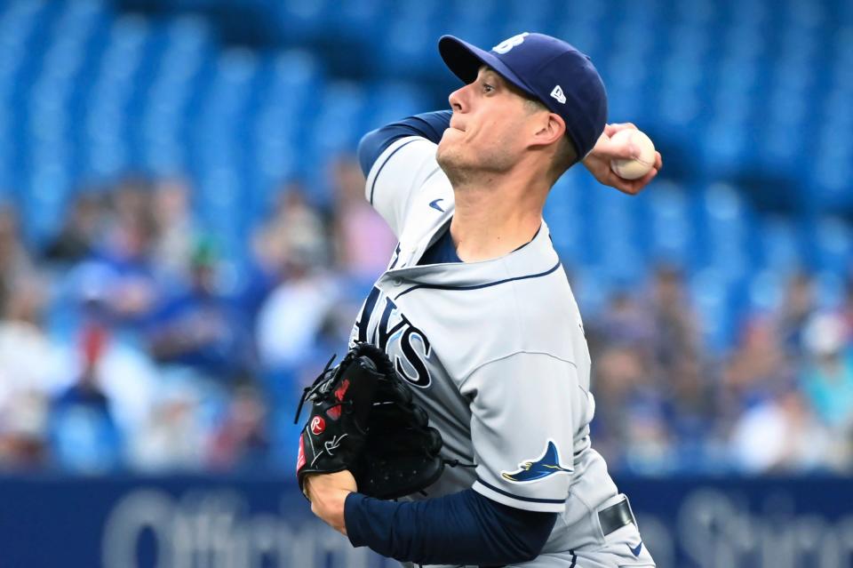 Tampa Bay Rays starting pitcher Matt Wisler throws to a Toronto Blue Jays batter during the first inning of a baseball game Thursday, June 30, 2022, in Toronto. (Jon Blacker/The Canadian Press via AP)