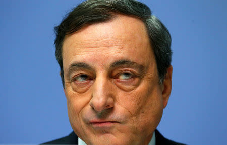FILE PHOTO - European Central Bank (ECB) President Mario Draghi is pictured during an ECB news conference in Frankfurt December 4, 2014. REUTERS/Ralph Orlowski/File Photo